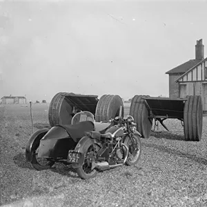 Motorbikes parked on the Dungeness beach in Kent. 1936