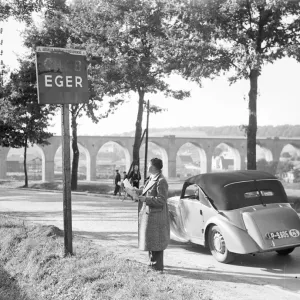 A motorist looking at the sign at the entrance to the town of Eger, the Sudetenland Storm Centre A motorist looking at the sign at the entrance to the town of Eger, the Sudetenland Storm Centre