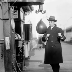 Print of Mr George Robey at the punch ball during a Brighton gala day Print of Mr George Robey at the punch ball during a Brighton gala day
