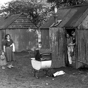 This is Mr Philip Rye and his wife, who have lived in the hut shown in the picture
