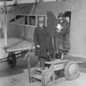 Mr Robert Courrneidge and his wife before leaving Croydon aerodrome on a flight to
