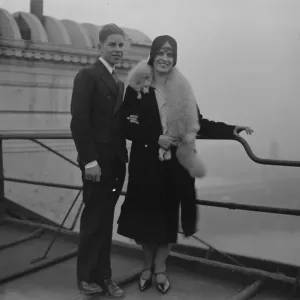 Mrs Aimee McPherson arrives. Mrs McPherson with her son on the roof her hotel after Mrs Aimee McPherson arrives. Mrs McPherson with her son on the roof her hotel after