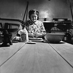 Mrs. Temperley prepares a pie in the kitchen of the Globe Tavern. A state owned pub in Longtown
