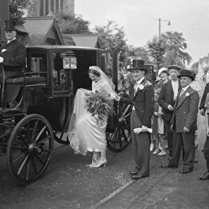An old fashion wedding at Eltham Parish church. The bride climbing onto the horse
