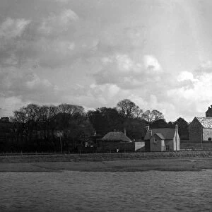 Old Shoreham and its church seen from the bridge over the river Adur. 1931