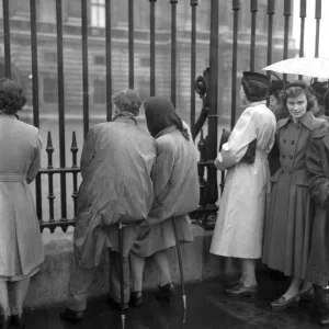 Outside Buckingham Palace this morning people seated on shooting sticks waited for