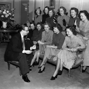 Six pairs of identifical twins, over here from America on a campaign to advertise a new home perm Six pairs of identifical twins, over here from America on a campaign to advertise a new home perm