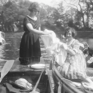 Peep show. Girls on the river at Teddington Washing up 8 May 1921