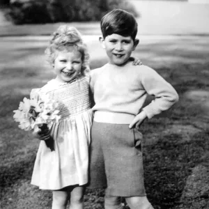 Prince Charles and his sister Princess Anne happy together in the garden of Royal Lodge