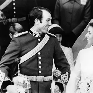 Princess Anne and Captain Mark Phillips as they walk out of Westminster Abbey after their wedding