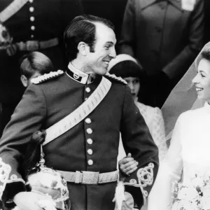 Princess Anne and Captain Mark Phillips as they walk out of Westminster Abbey after their wedding