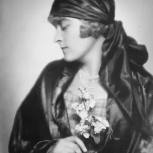 Profile on coinage. Mme Berta Braun, a Society woman, whose charming profile Profile on coinage. Mme Berta Braun, a Society woman, whose charming profile