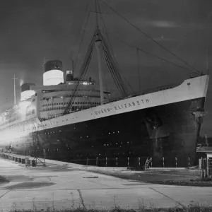 The Queen Elizabeth in dry dock. After hold-up at 12 hours due to unfavourable weather