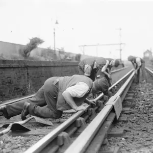 A railwayman gauging railway lines in Sidcup, Kent. 1937