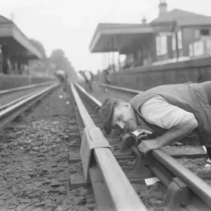 Print of a Railwayman Measuring Railway Tracks in Sidcup, Kent