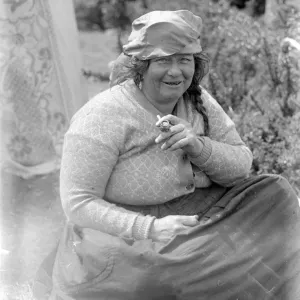 Print of a Romany gypsy woman smoking a pipe at Epsom Races