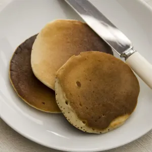 Three Scotch pancakes on a white plate. credit: Marie-Louise Avery / thePictureKitchen Three Scotch pancakes on a white plate. credit: Marie-Louise Avery / thePictureKitchen