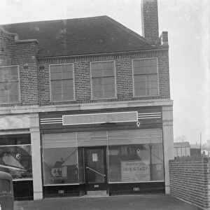 The empty shop window of Robins Stores at Grove Park. 1936