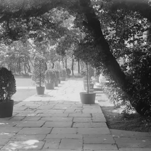 Sir Sidney Grevilles old world manor house at Hove. One of the picturesque garden paths Sir Sidney Grevilles old world manor house at Hove. One of the picturesque garden paths