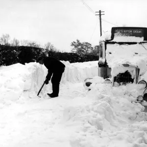 Snow up on the roof of this bus at Cudham, Kent. Two other buses suffered the same fate