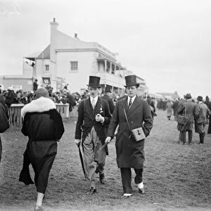 Society at Epsom on Oaks day. Lord Portarlington ( right ) with a friend. 8 June 1923