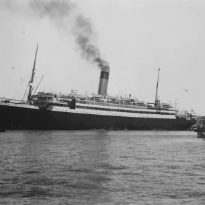 SS Megantic coaling in Port Said harbour with troops on board for the Far East. 4 SS Megantic coaling in Port Said harbour with troops on board for the Far East. 4