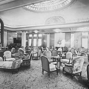 SS Paris The drawing room ( raised platform with piano and row of chairs on extreme left
