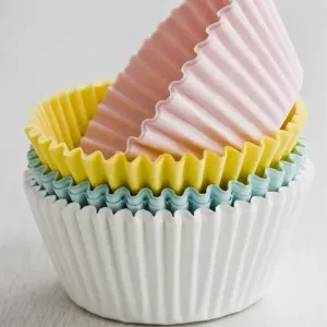 Stack of coloured paper cake and muffin cases credit: Marie-Louise Avery / thePictureKitchen Stack of coloured paper cake and muffin cases credit: Marie-Louise Avery / thePictureKitchen