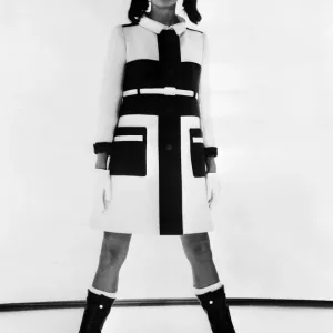 This striking Winter topcoat could only have been created by Courreges. On a slender This striking Winter topcoat could only have been created by Courreges. On a slender