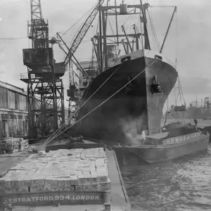 Sunday unloading to escape Tariffs. All day Sunday the Thames docks presented Sunday unloading to escape Tariffs. All day Sunday the Thames docks presented