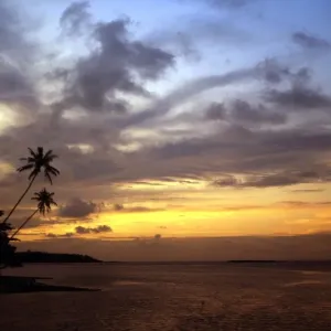 Sunset over a Polynesian island Sunset over a Polynesian island