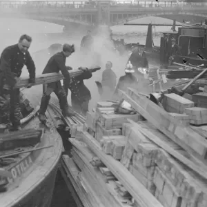 Timber barge on fire at Vauxhall, London