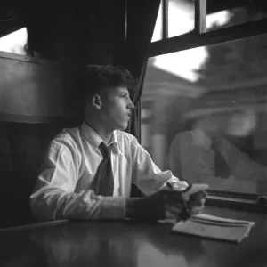Trainspotters Club outing A young train spotter sitting in the railway carriage Trainspotters Club outing A young train spotter sitting in the railway carriage