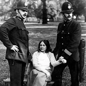 Votes for Women - policeman with a suffragette arrested in Hyde Park about 1912