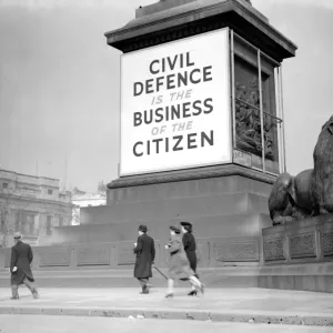 War Crisis, 1939. Air Raid precautions Civil Defence poster in Trafalgar Square War Crisis, 1939. Air Raid precautions Civil Defence poster in Trafalgar Square