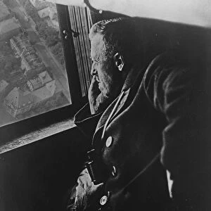 At the window of the new zeppelin. Dr Hugo Eckener, the constructor of the great new zeppelin