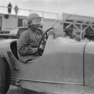 Woman driver defies the cold wind when she practises at Brookland. Drivers practised