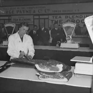 Woman seeks bacon slicer championships at grocers exhibition Woman seeks bacon slicer championships at grocers exhibition