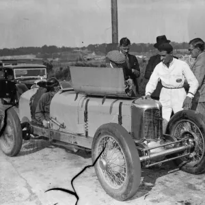 Women racing champions practice for thrill speed duel at Brooklands. Mrs Kay Petre