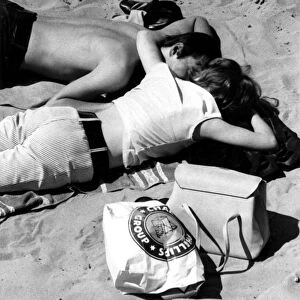 Young couple on the beach 1960s love couple romance romantic for valentines