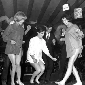 Three Young Women Practicing The Twist in Fashionable Shirts, Print Three Young Women Practicing The Twist in Fashionable Shirts, Print