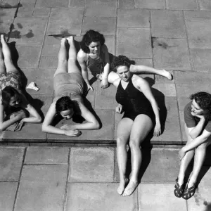 Young women sunbathing at Gravesend baths, May 1946 Print