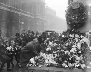 10th anniversary of the Armistice. Laying tributes at the foot of the Cenotaph, London