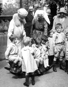 Social Prints: 12 June 1928 Queen Mary visiting the Emergency Home for Children at Beauchamp Lodge