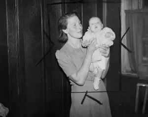 Living Conditions Prints: This 3-month-old girl, daughter of an ex-POW still serving in the forces is squatting