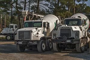 Trucks Collection: 3 x cement mixers parked up on waste ground on Manitoulin Island Ontario Canada