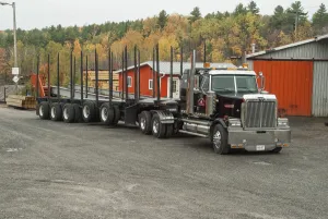 Timber Prints: A 6 x4 western star tractor unit hitched up to a 5 axle (2 of which are lift axles)