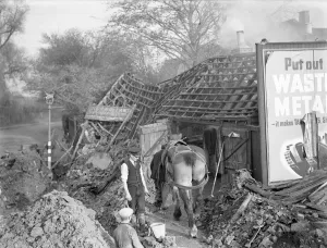 9 November 1940 Doug Hollands blacksmith forge, over 100 years old. Despite being