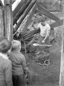 9 November 1940 Doug Hollands blacksmith forge, over 100 years old. Despite being