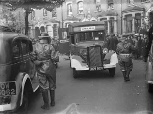 Air Raid Precaution exercise on Old Kent Road in London. A Bedford ambulance taking